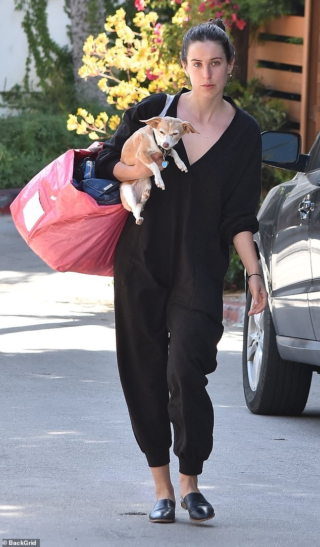 Scout Willis is casually stylish in loose-fitting black jumpsuit as she