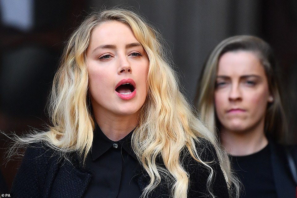 Amber Heard fights back tears outside High Court healthyfrog