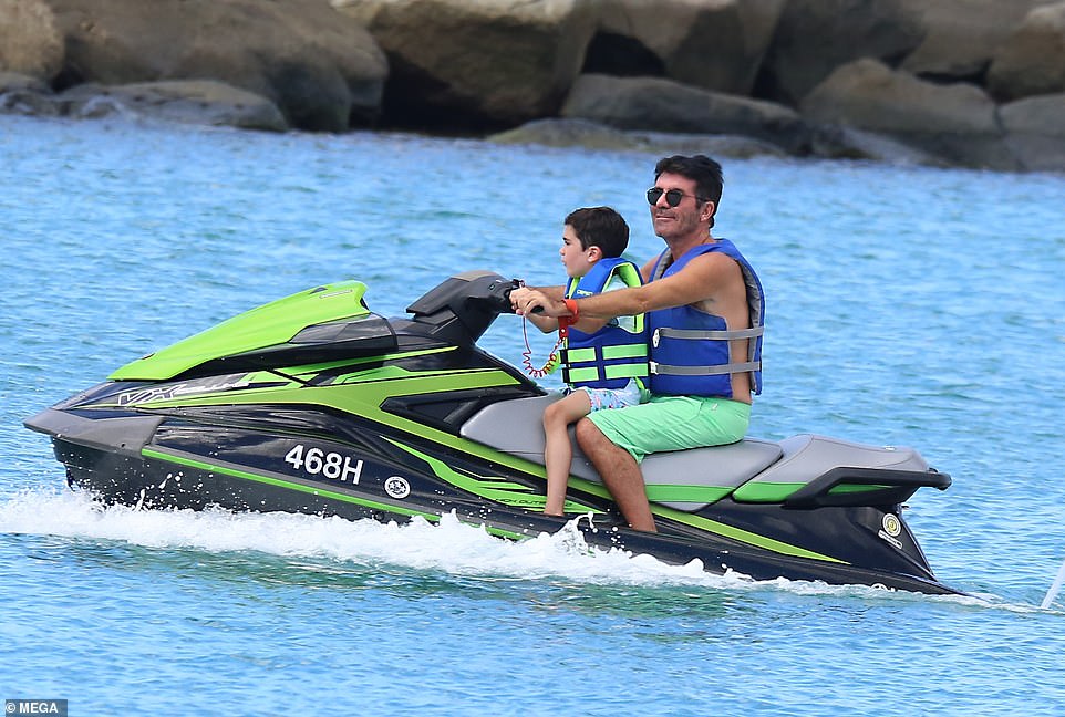 Simon Cowell proves he’s on the road to recovery as he rides a jet ski ...